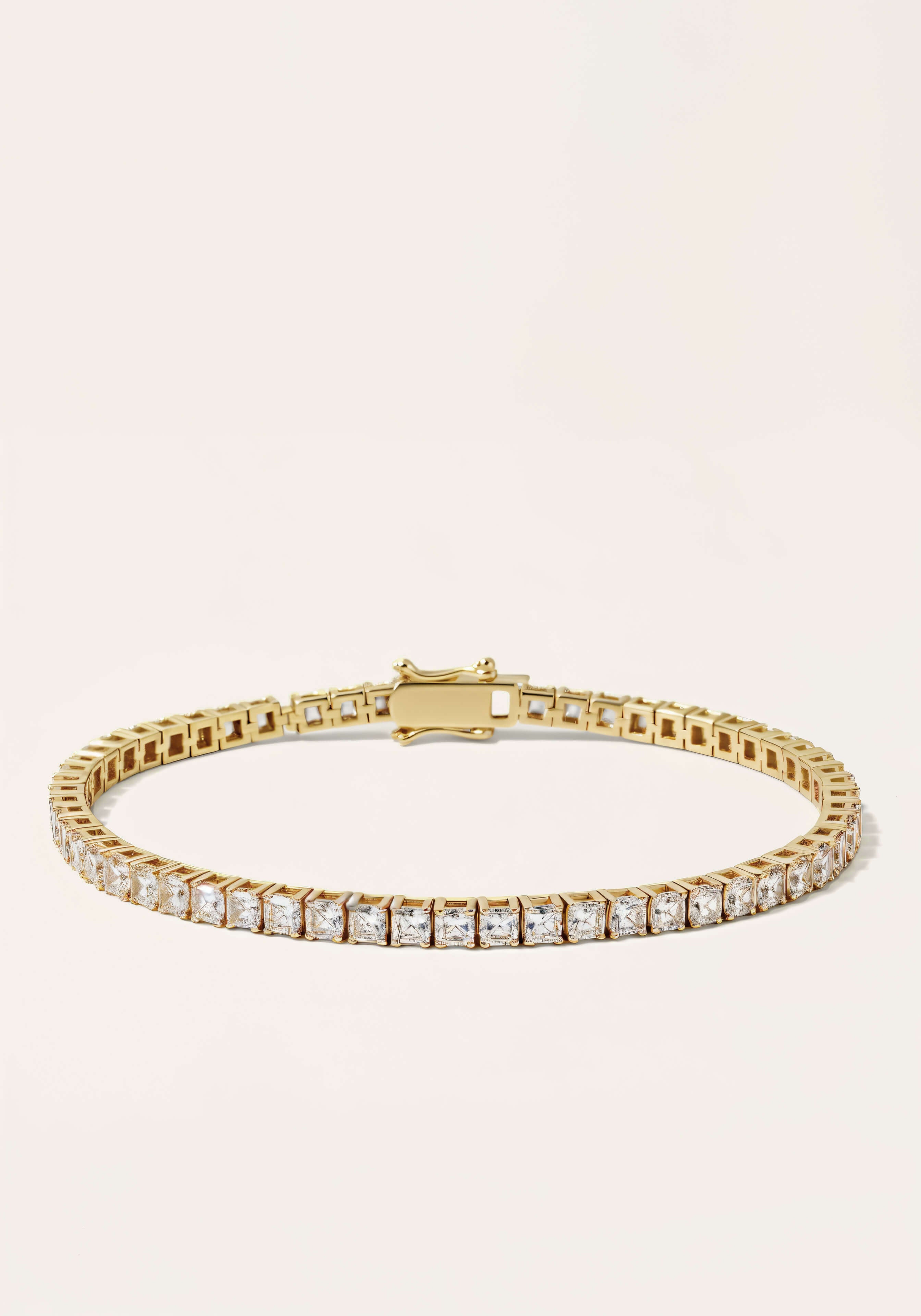 A yellow-gold tennis bracelet, a continuous strand diamonds set in square links.